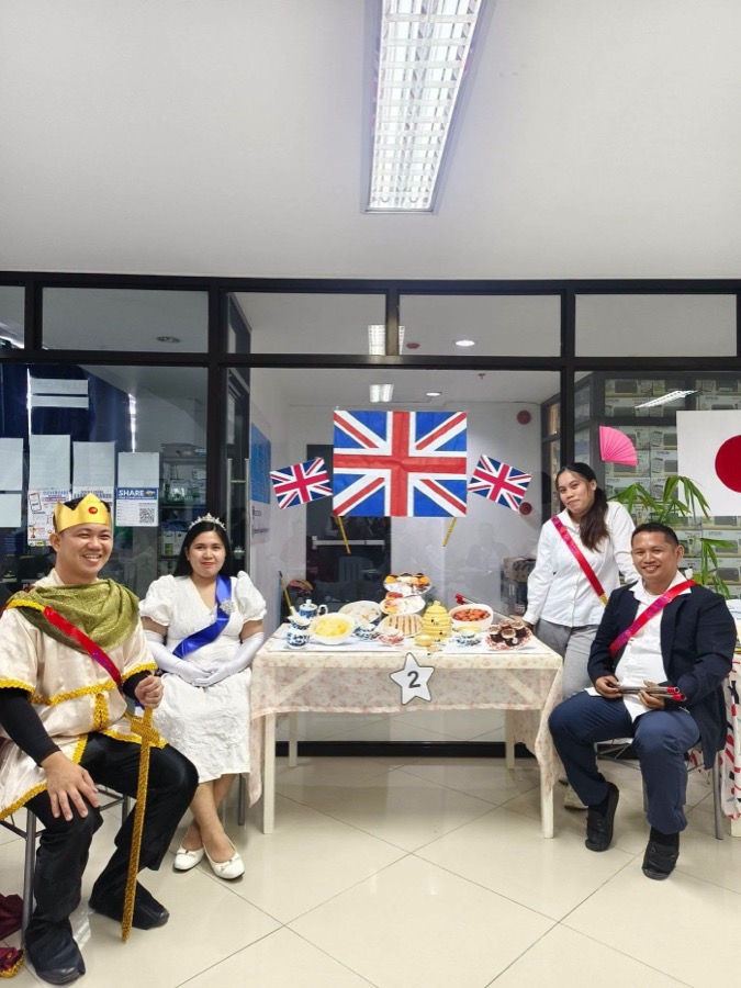 CleverCare staff in costume for Britain-themed culture day