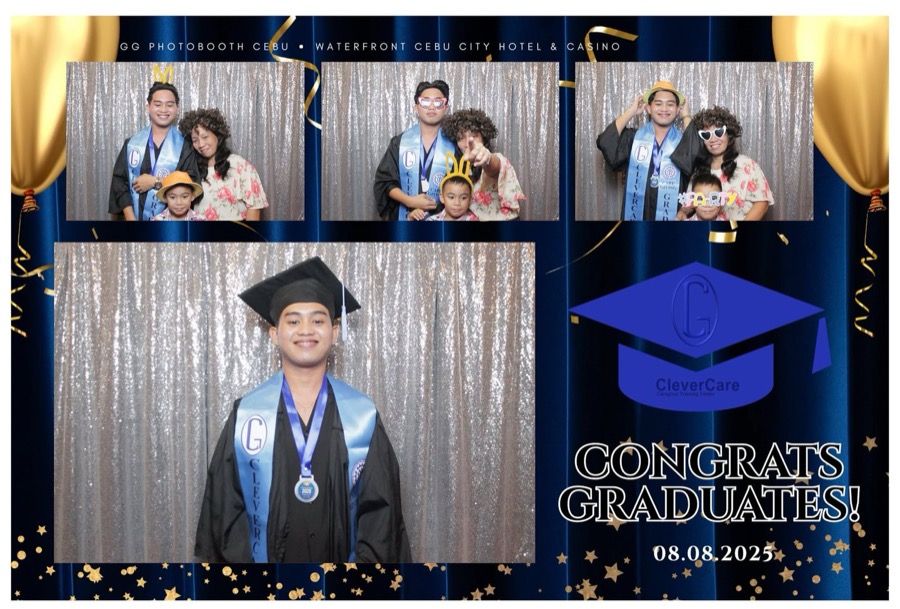 CleverCare graduate with family at the graduation photobooth