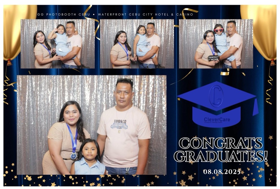 CleverCare graduate with family at the graduation photobooth