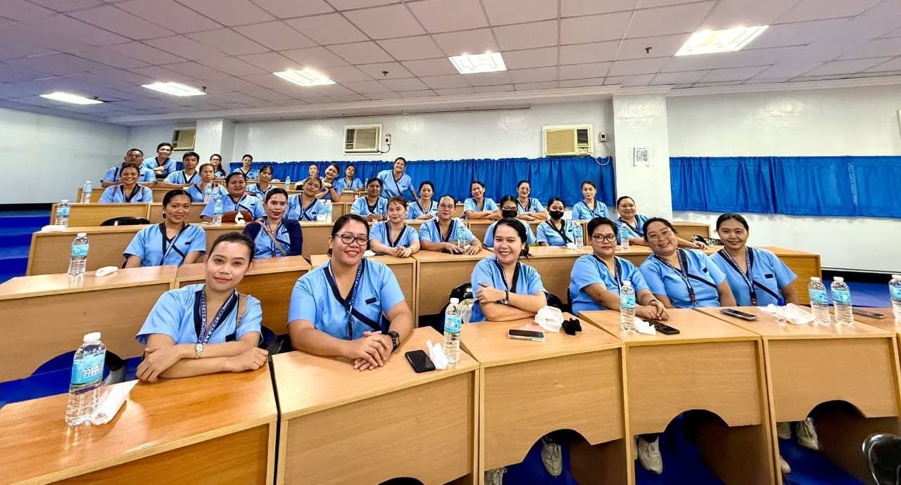CleverCare students together in a training lecture hall
